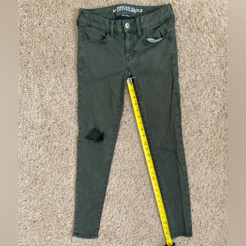 American Eagle Distressed Green Jeggings size 2